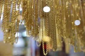 Gold nears all-time high as investors await Trump tariff plan