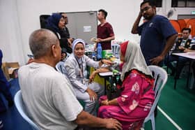 Pejabat Parlimen Puchong salur RM1,000 kepada mangsa di Kampung Kuala Sungai Baru, Kampung Tengah