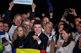 EU leaders relieved after centrist beats pro-Trump rival to Romanian presidency