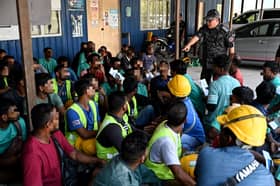 Illegals jump into swamp to avoid Immigration raid