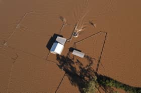 Death toll in Australia floods rises to four, tens of thousands stranded