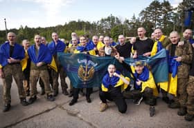 Russia, Ukraine each free first 390 prisoners in start of war's biggest swap