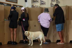 Australians vote in national election with their sights on Trump, living costs