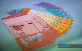 Ringgit higher after OPR stays put at 2.75 pct