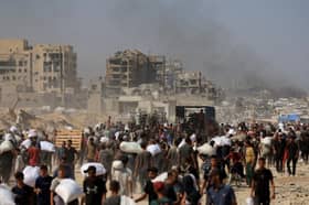 Israeli military announces daily pauses in Gaza areas to allow aid for the hungry