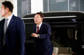 S. Korea’s ex-president Yoon defies summons in martial law probe