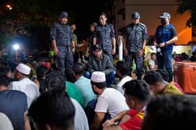 Online gambling den busted in Serdang apartment raid, 496 illegal immigrants detained