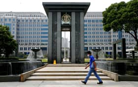 Indonesia's central bank surprises with rate cut, raises GDP outlook