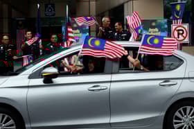 新闻局与内贸部国庆月合作 将“一屋一旗”运动扩至工商界