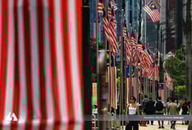 Don't politicise upside-down Jalur Gemilang issue — Exco