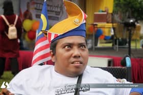 OKU berkerusi roda redah lebih 1km demi sambut Hari Kebangsaan