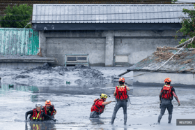 Taiwan rescuers battle thick mud to look for Super Typhoon Ragasa victims