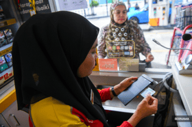 内贸部有权查验身份证 确保汽油补贴顺利落实