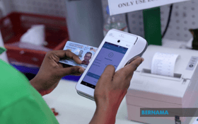 人民争相更换大马卡  5天更新逾万张损坏晶片