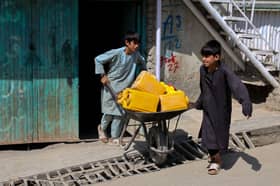 Afghan wells run dry, kids quit school to queue for water