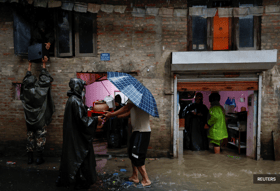 Heavy rains kill at least 22 in Nepal, block roads