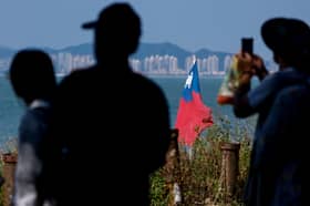 China says ‘absolutely will not’ rule out use of force over Taiwan