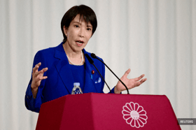Japan's likely next PM wrestles coalition backlash