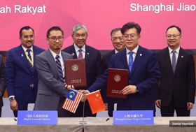 扎希：加强学术文化合作  玛拉上海交大签署备忘录