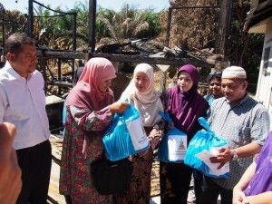 Families of 2 fire victims helped