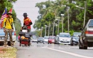 Two brothers walk across the peninsula on a mission to clean mosques