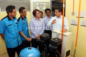 雪政府礼堂装置集雨系统  黄洁冰：30%节水显成效