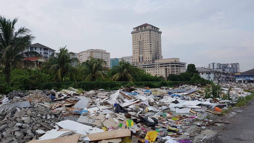学校保留地变垃圾场  安邦市会查办幕后黑手