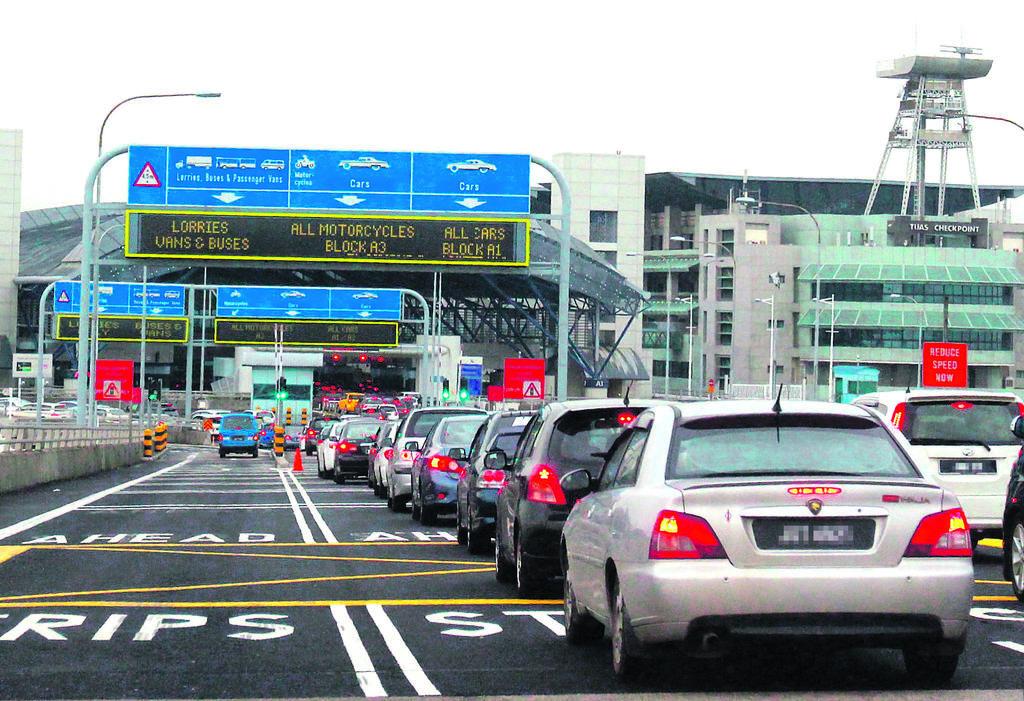Pulai by-election: PH candidate proposes special lane for voters from Singapore