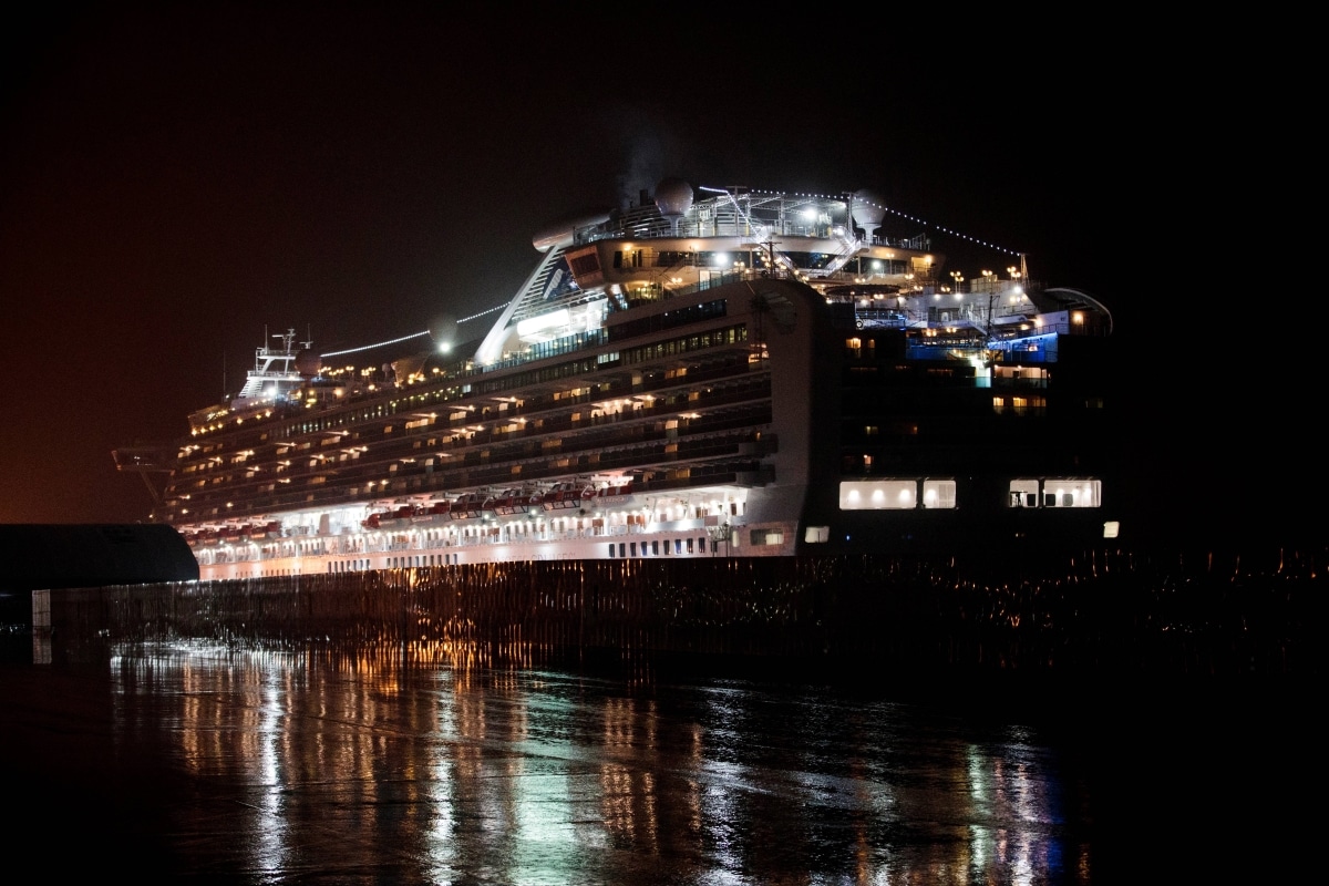 Passengers start disembarking from virus-hit Diamond Princess in Japan