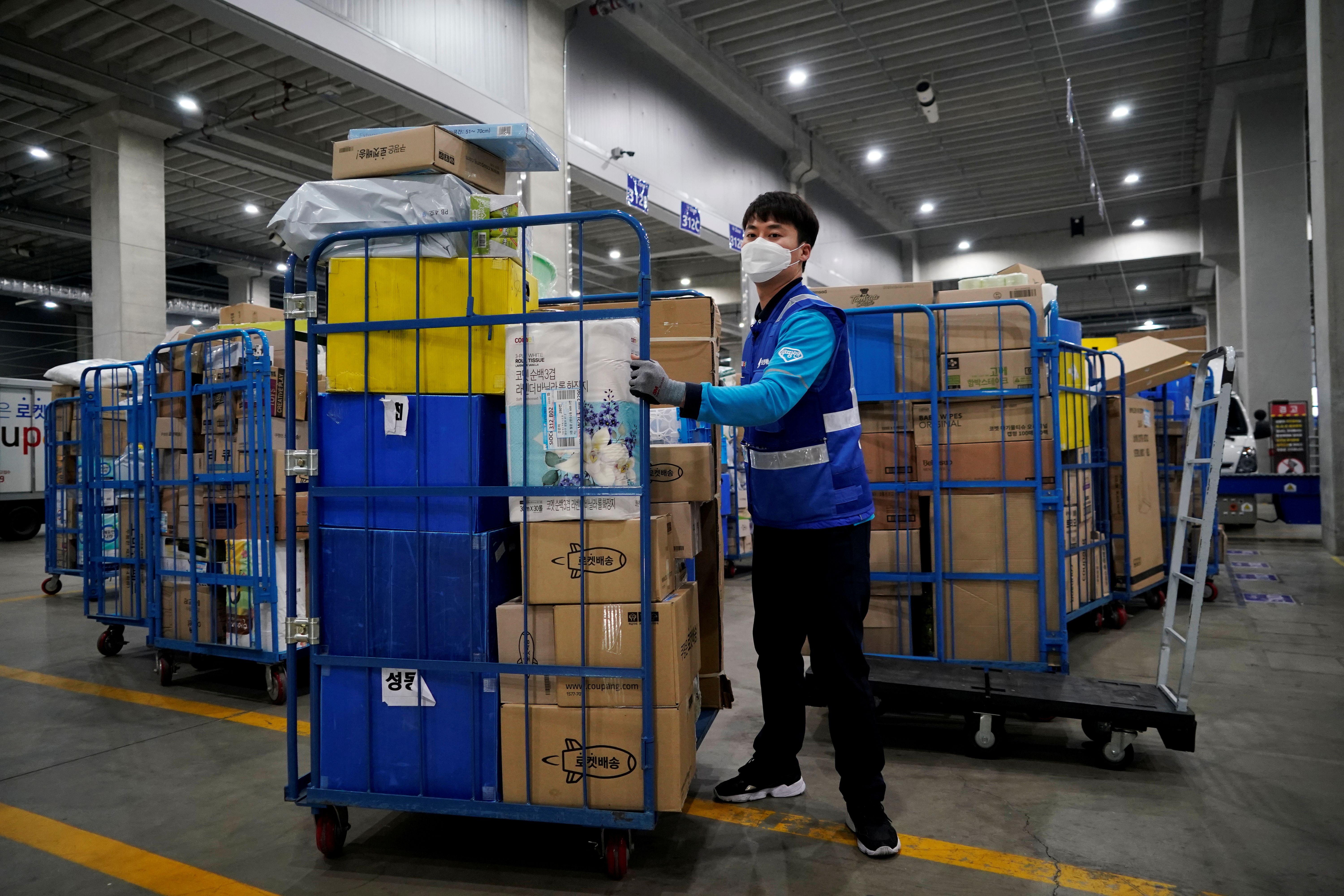 Covid-19 outbreak at S.Korea e-commerce warehouse drives spike in new cases