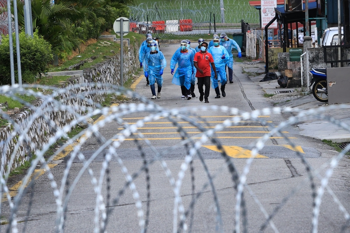 Covid-19 screenings focus on foreign workers in two sectors