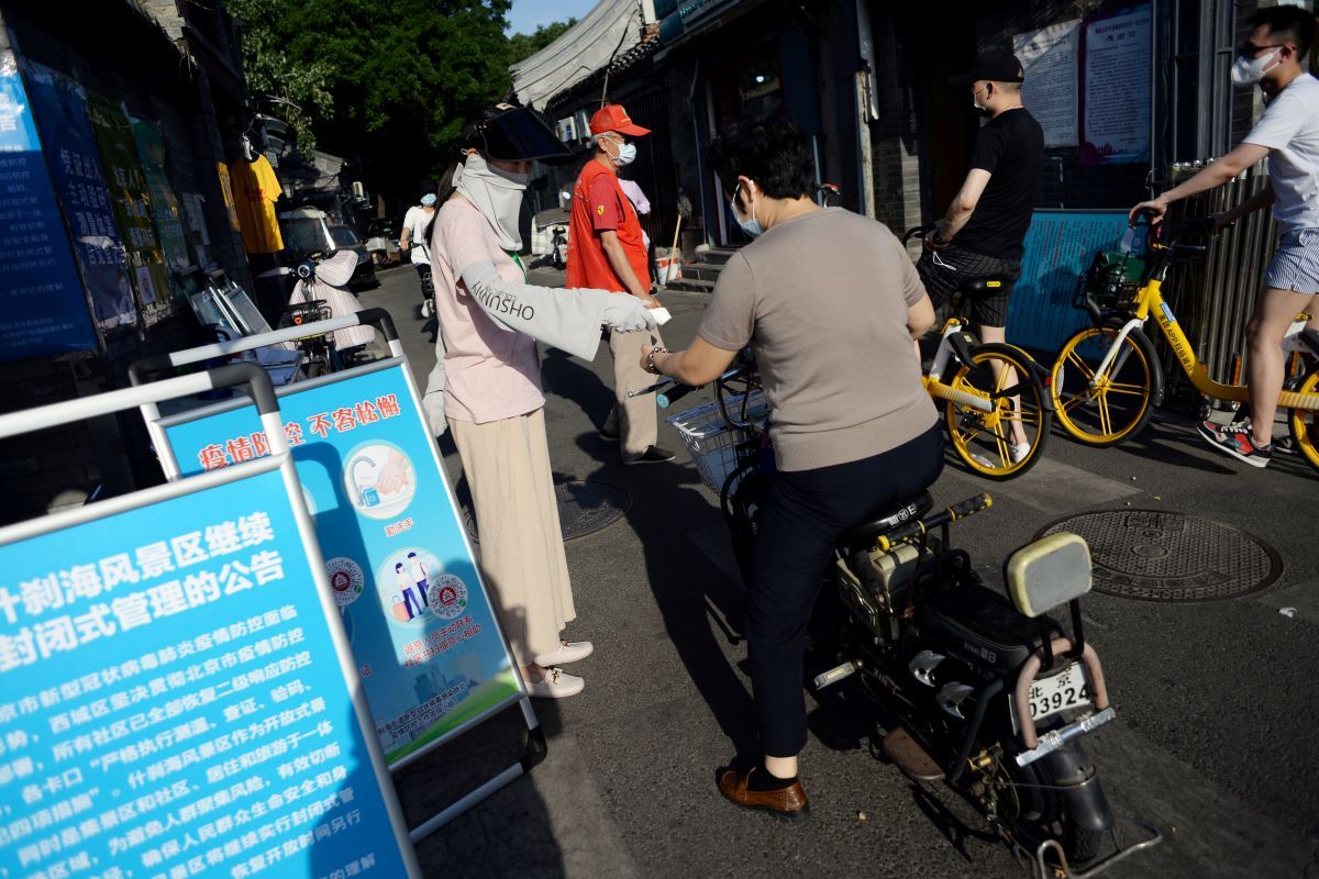 Beijing on heightened alert as coronavirus cases mount