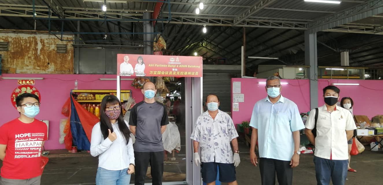 王建民偕王诗棋拨款  锡米山巴刹设消毒通道