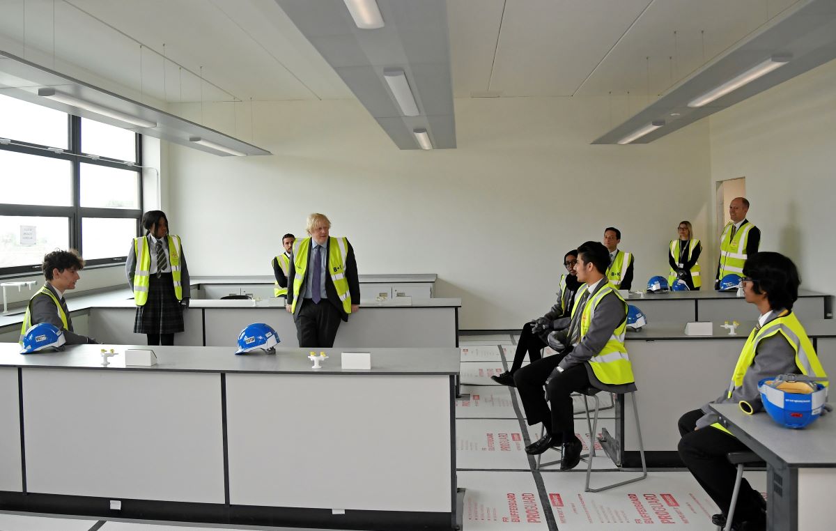 England schools in Covid hotspots to bring in face masks after government U-turn