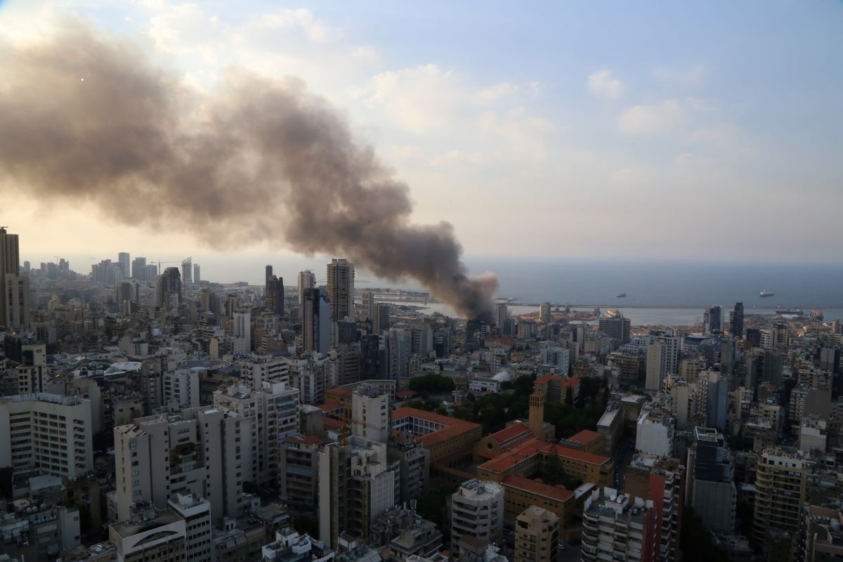 Lebanese firefighters douse remains of Beirut port fire
