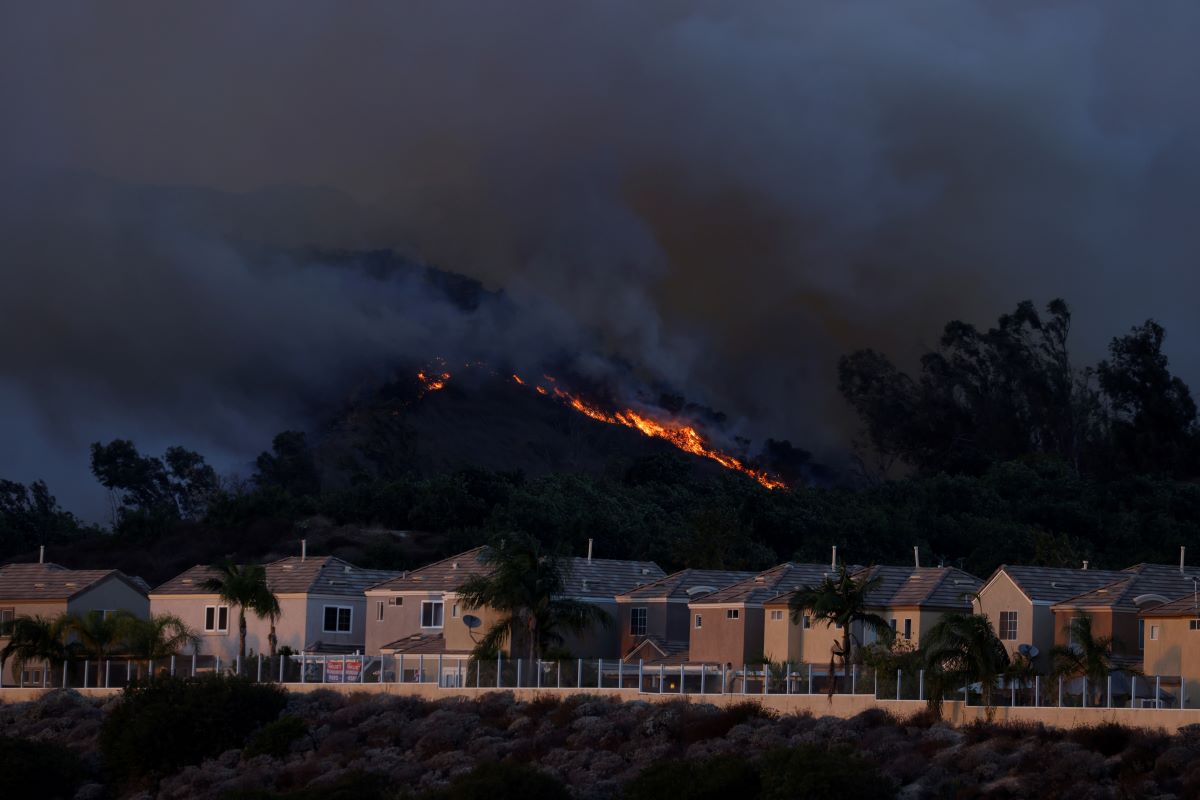 Over 60,000 evacuated as California wildfire rages
