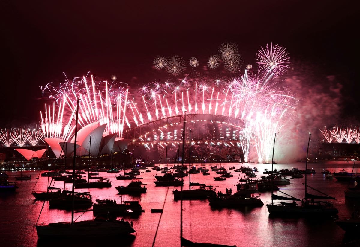 'I will survive': 2020 slinks into history as fireworks light deserted streets