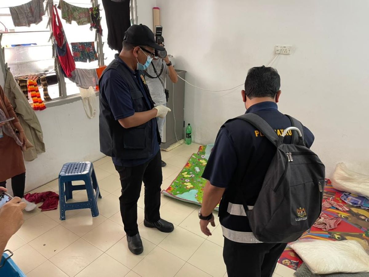 Two rubber gloves workers' quarters congested, not certified