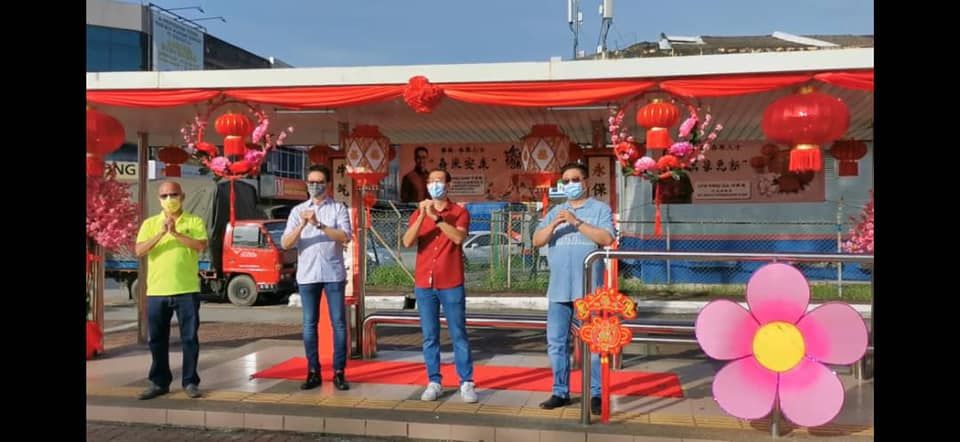 永安镇闹市披春装喜洋洋  邓章钦：疫情下过好年