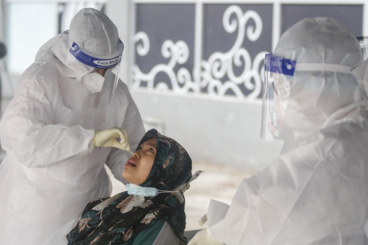 Public urged to undergo Covid-19 screening before receiving vaccines