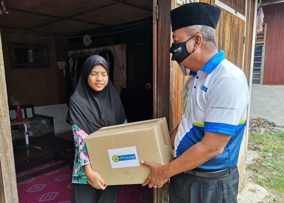 LZS santuni empat penerima zakat, erat hubungan