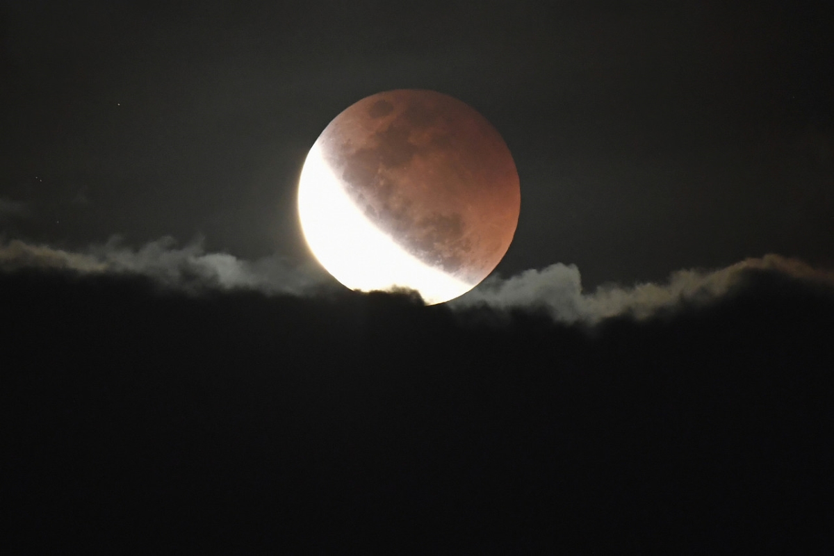 Super Flower Blood Moon appears in night skies above Malaysia