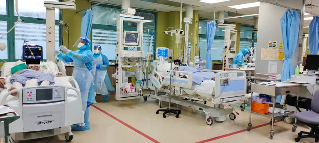 Symptomatic hospital admission cases new indicator for NRP phase transitions