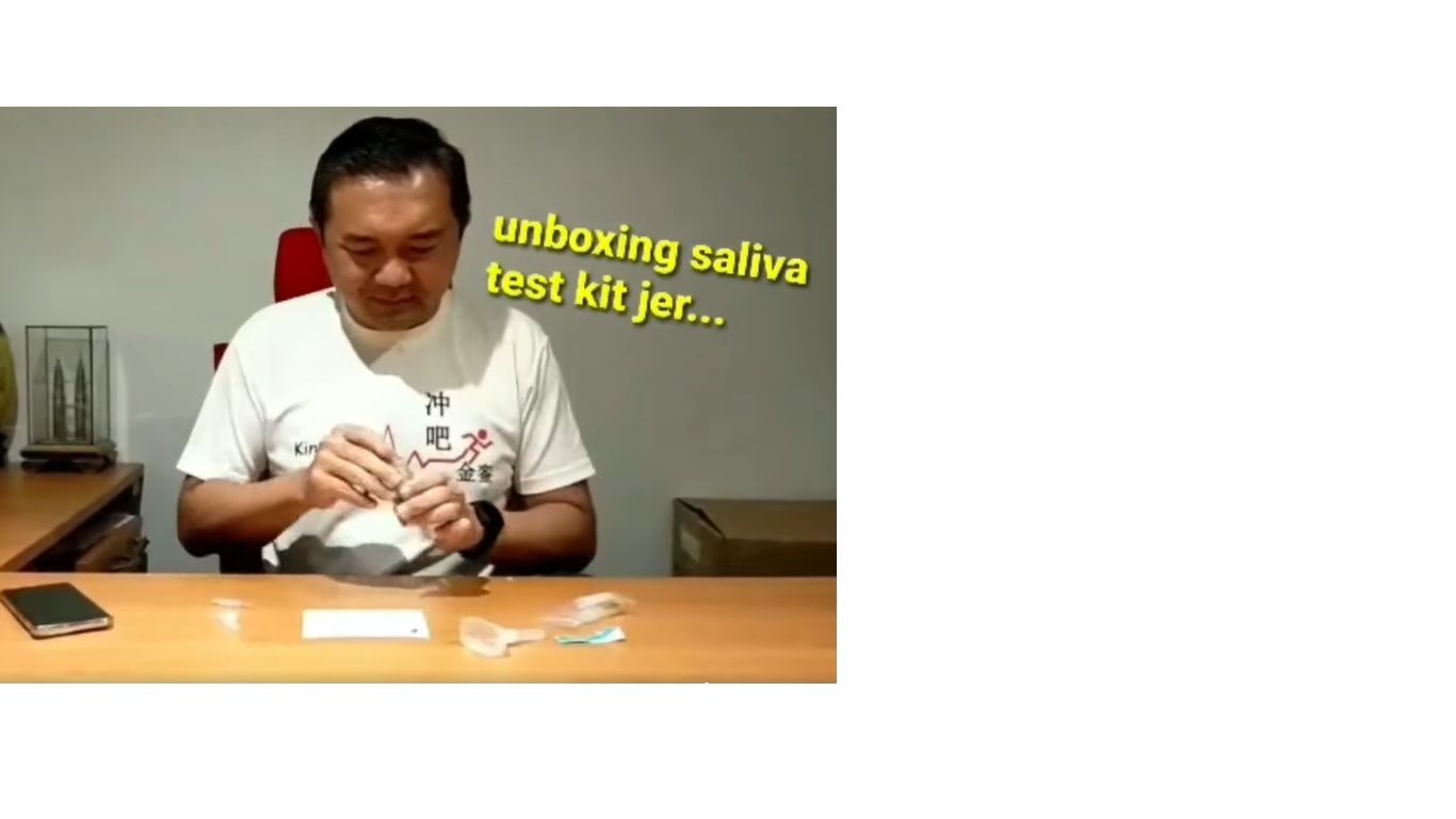 黄思汉开箱试用唾液测冠病 结果呈阴性