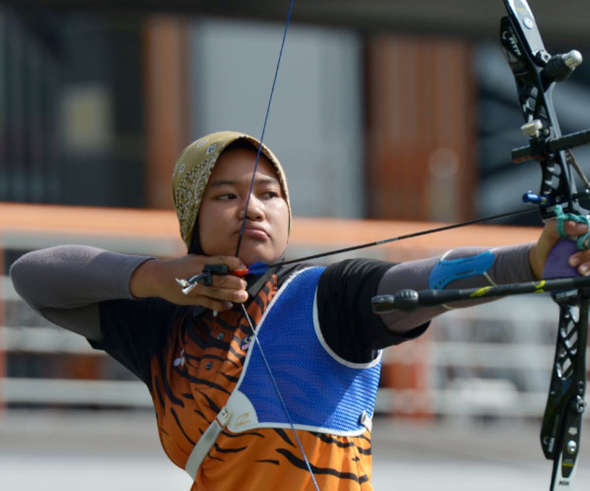 Archer Syaqiera takes opponent down to the wire before bowing out