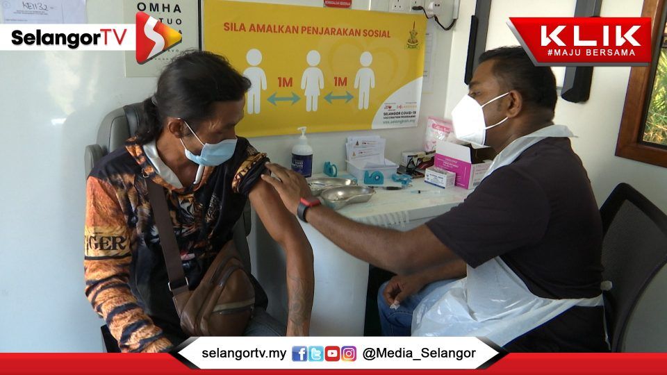 雪流动疫苗车昨到昔江港  300居民外劳事前登记.场面井然有序