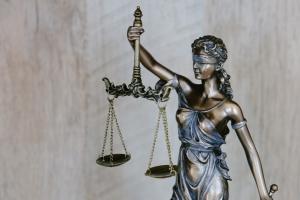 Five including Datuk charged with illegal deposit taking