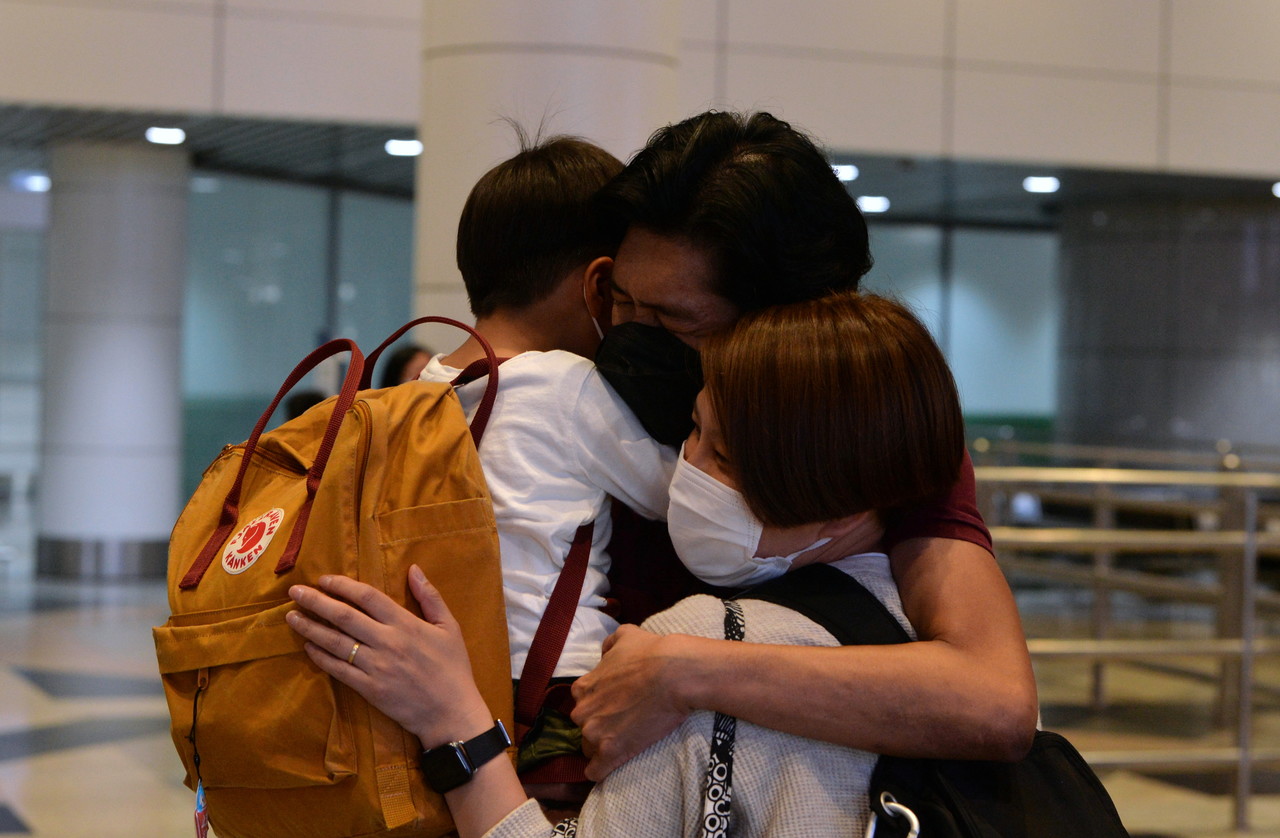 Border reopening: Extreme joy for travellers arriving at KLIA