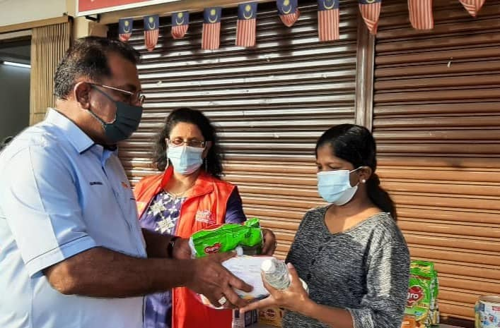 Sentosa rep spends RM60,000 on food baskets, school aid for the needy