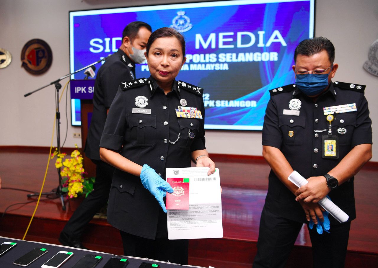 Two arrested for duping Malaysians into joining scam syndicate